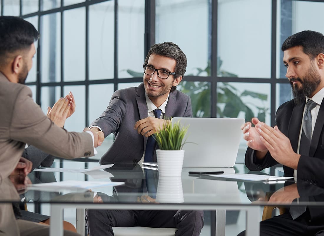 Premium Finance - Business People Shaking Hands After a Meeting